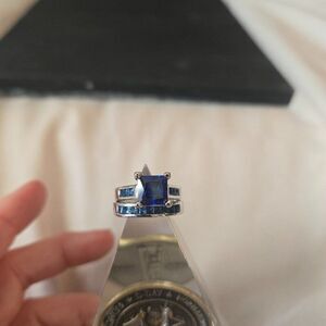 Silver with blue stones wedding set size 7, new and unused